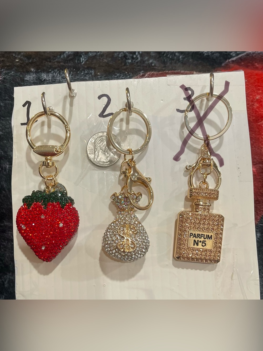 #8 Choice of 1 Strawberry, Money Bag or Perfume Keychain with Gold Accents